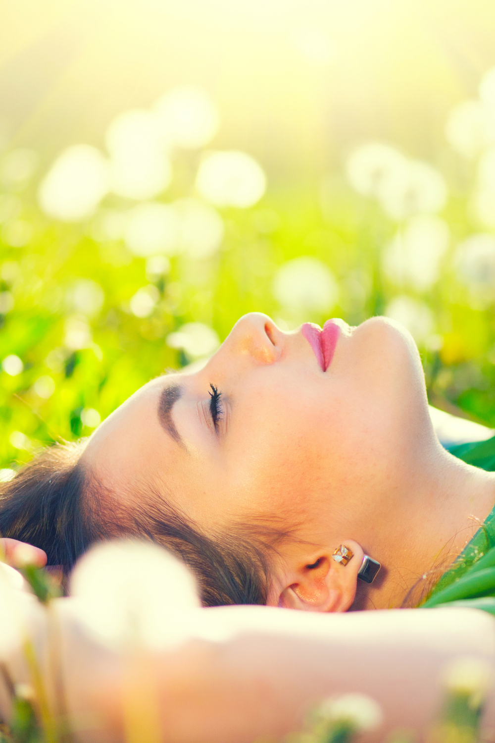 a woman who knows why mindset work isnt' enough so she is learning how to rewire her nervous system for pleasure by being in sensual stillness in nature